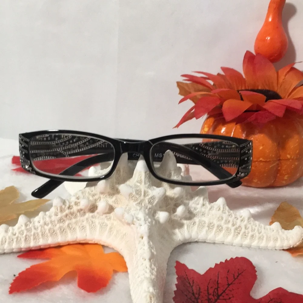 Foster Grant woman’s black reading glasses with faux rhinestones and tan swirls